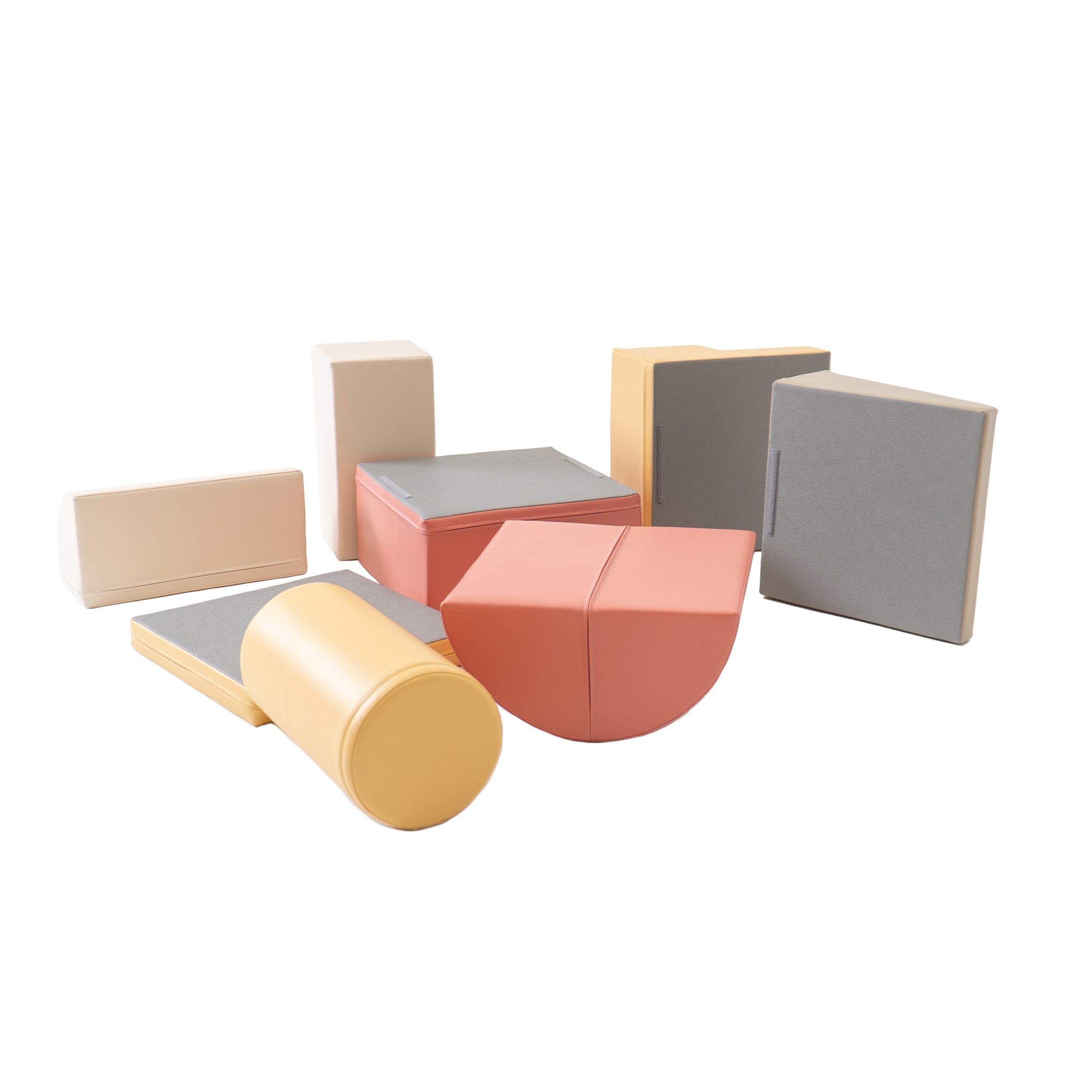 Adventurer beige and pink soft play blocks displayed to show underside and shape variety