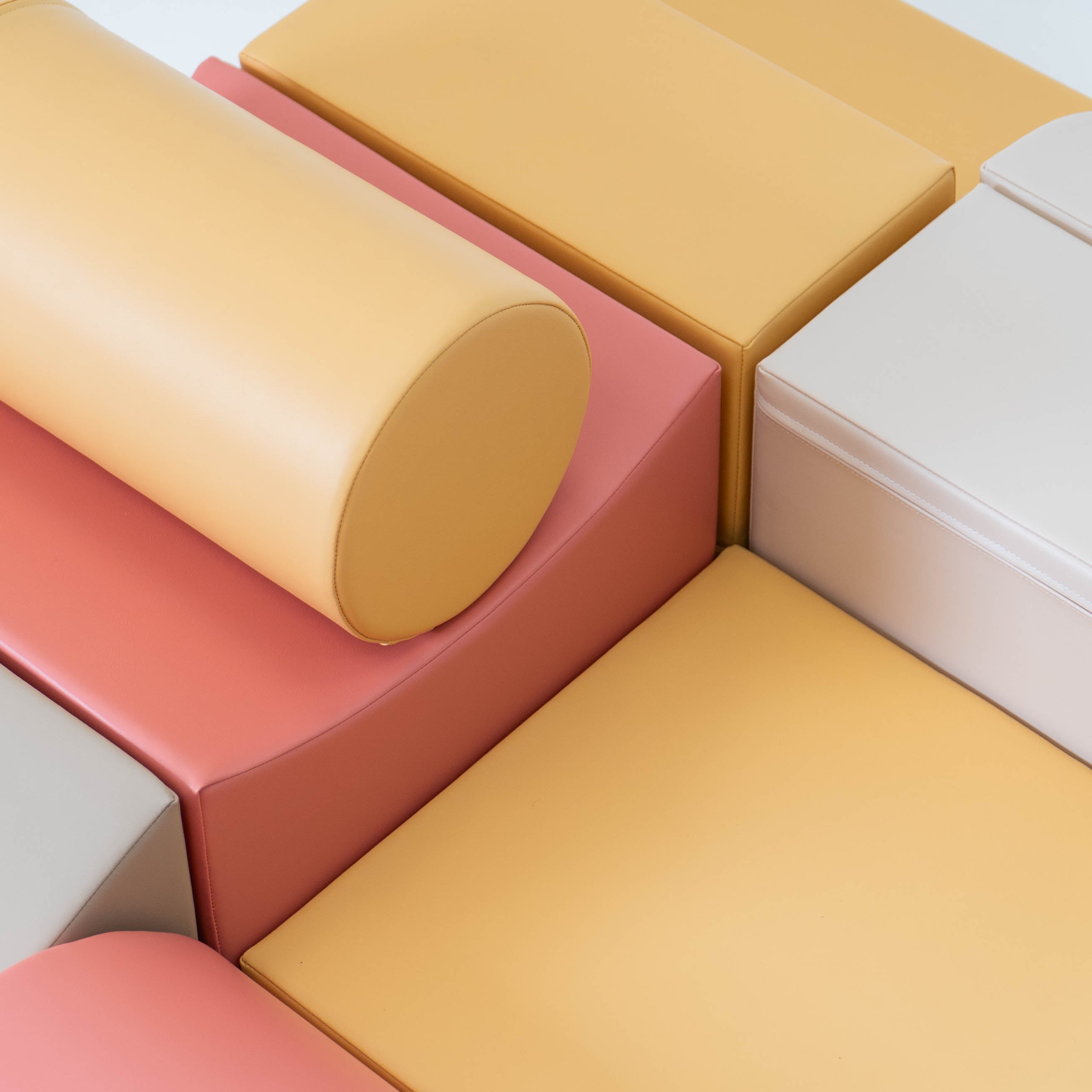 Close-up of Adventurer beige and pink foam play blocks showing texture and quality
