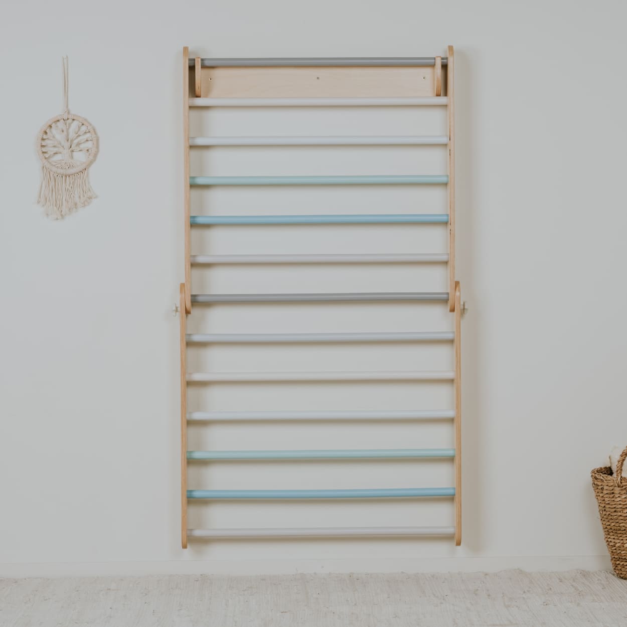 Wooden Swedish ladder gym that can be used as pikler triangle.