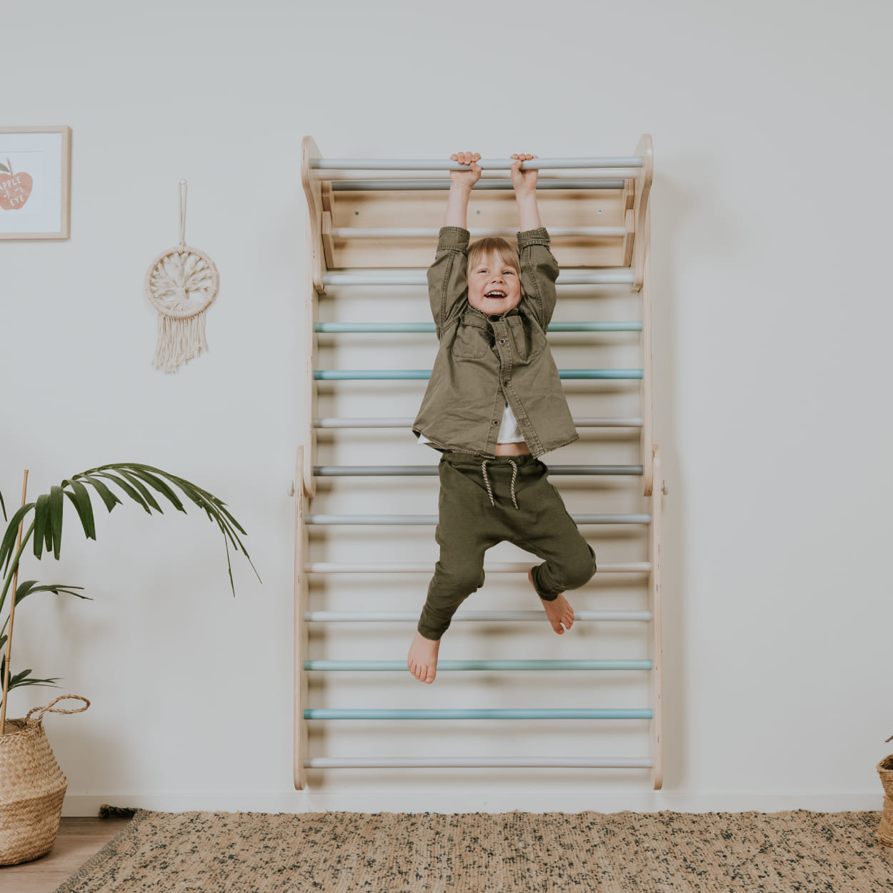 child enjoying Swedish ladder play gym set