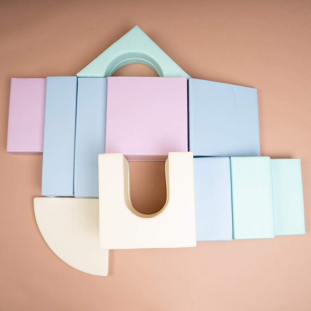 All components of the light pastel Creativity soft play set displayed on the floor