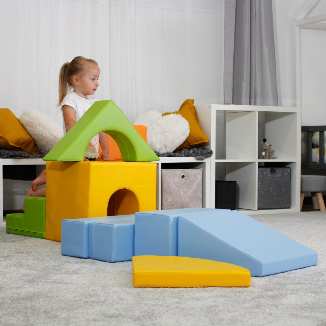 Girl playing with light colorful Creativity soft play block set