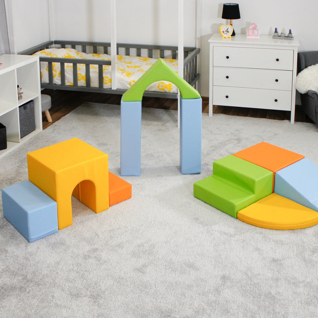 Soft play Creativity set in light colorful tones arranged into archway