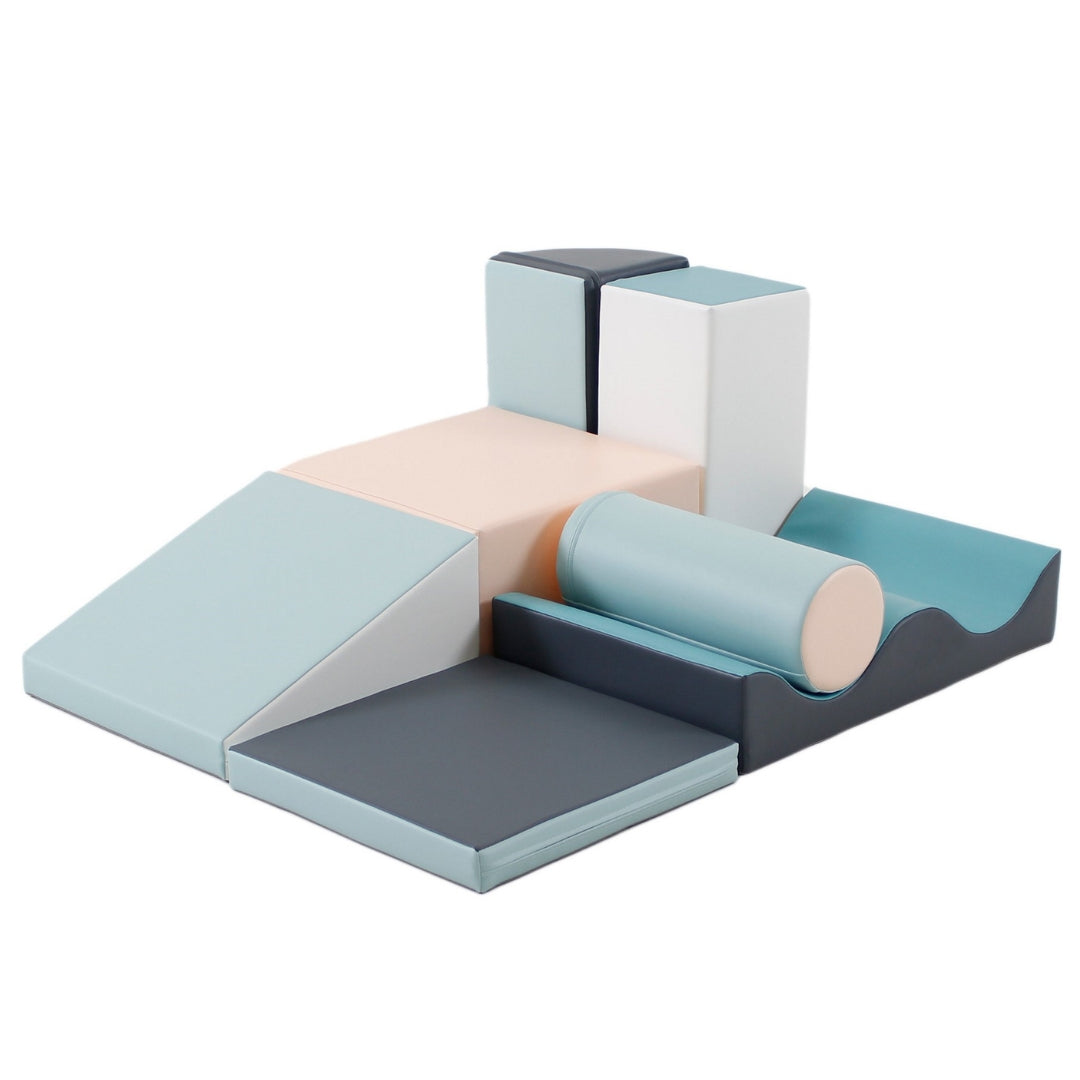 Light pastel Discoverer soft play blocks set with curved, round and angular shapes in layered layout