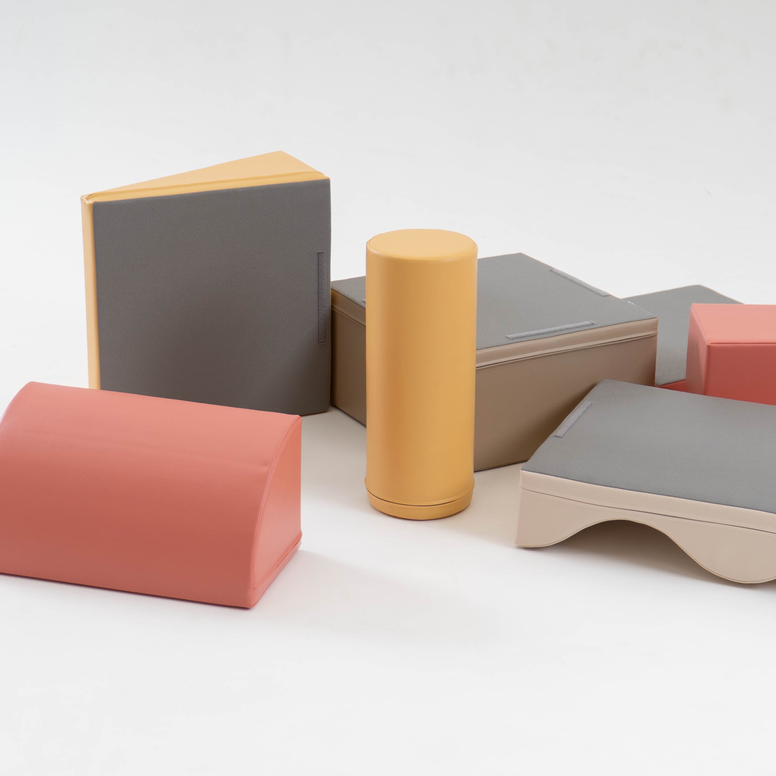 Discoverer set blocks laid out in beige and pink colors with curved and round shapes