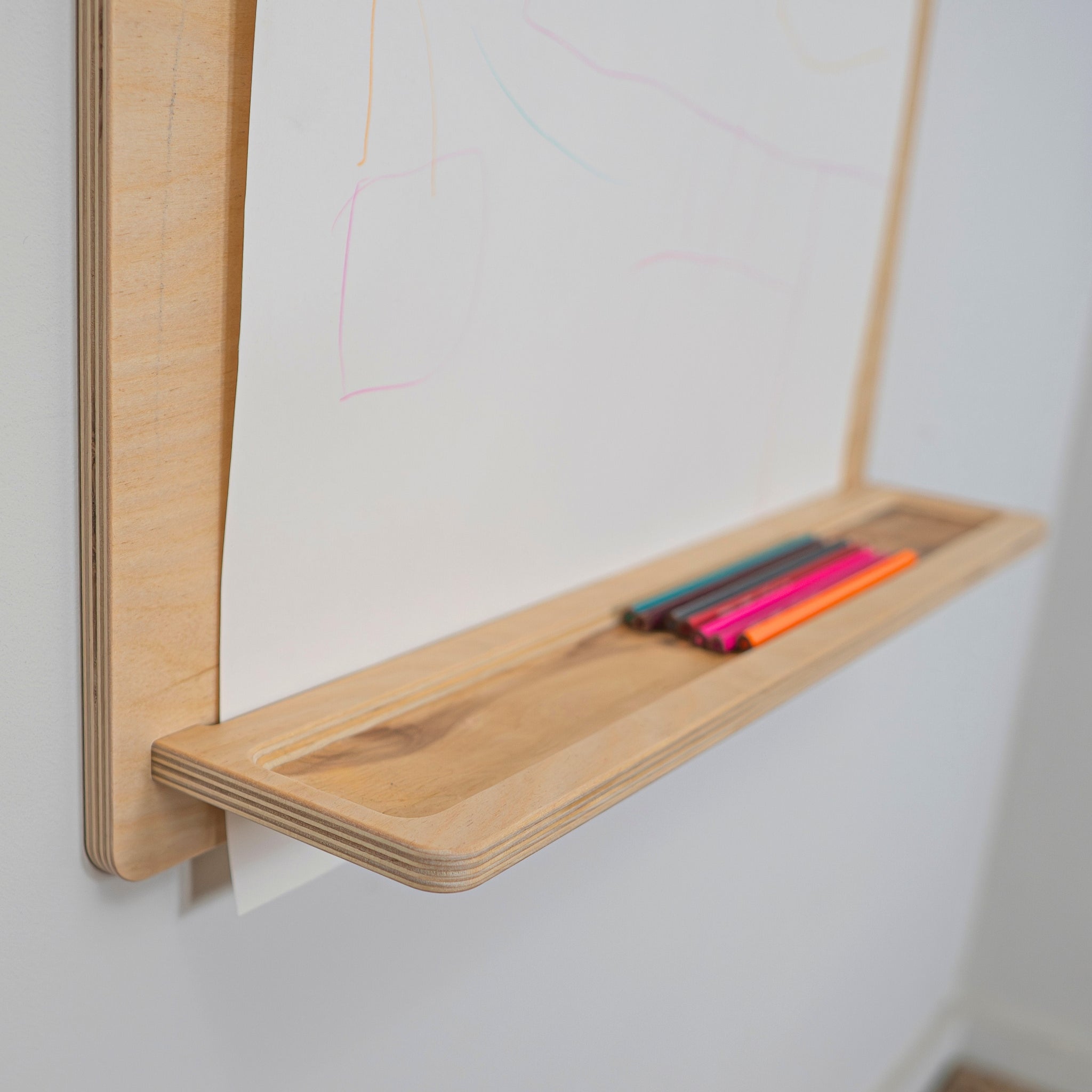 Wooden wall mounted art board with built-in storage tray for pencils