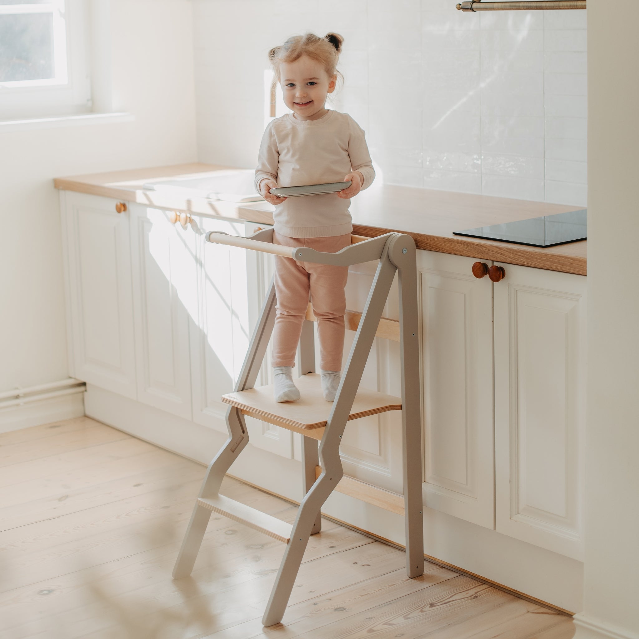 pastel gray foldable helper tower for toddler kitchen learning