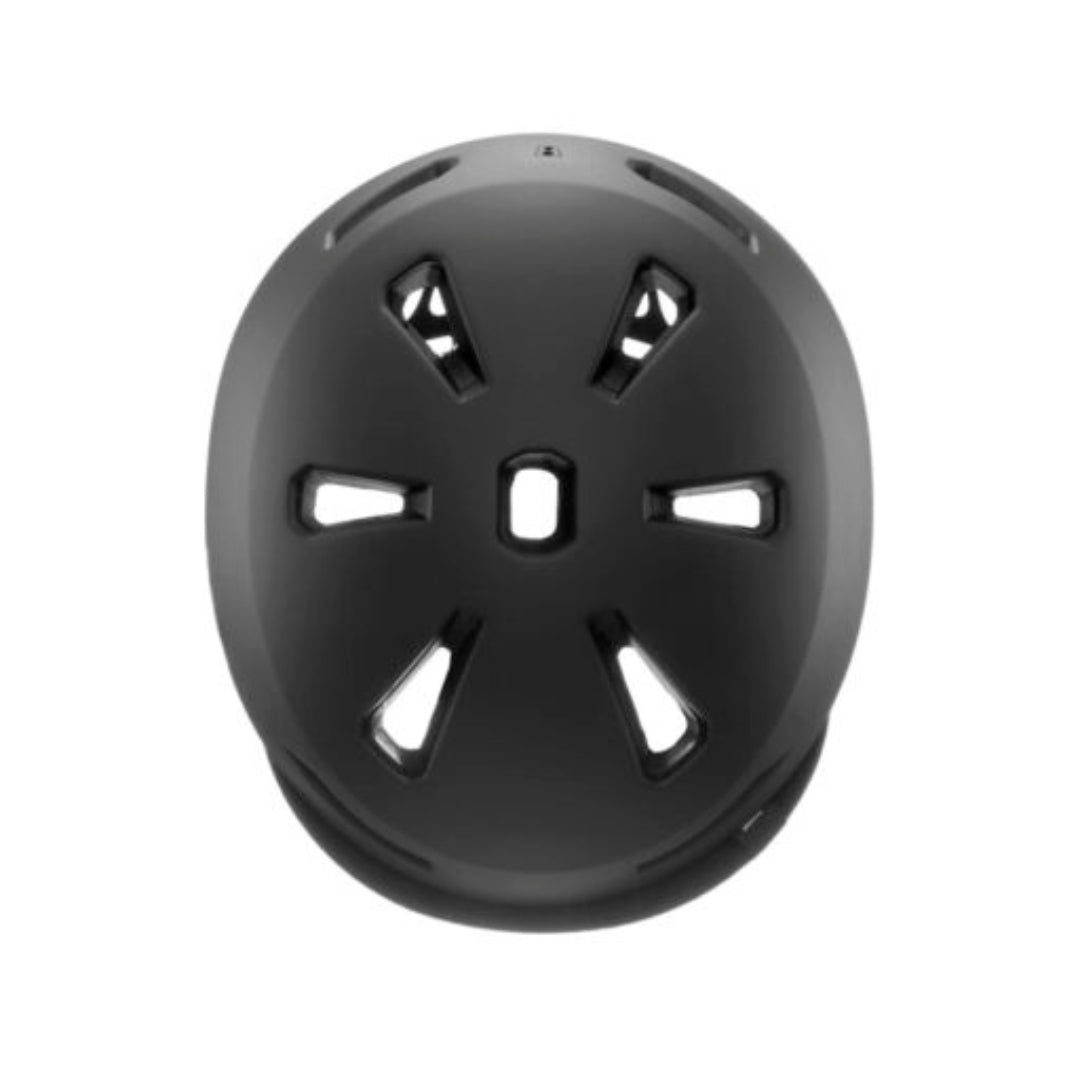 Black kids’ helmet presented on a white background
