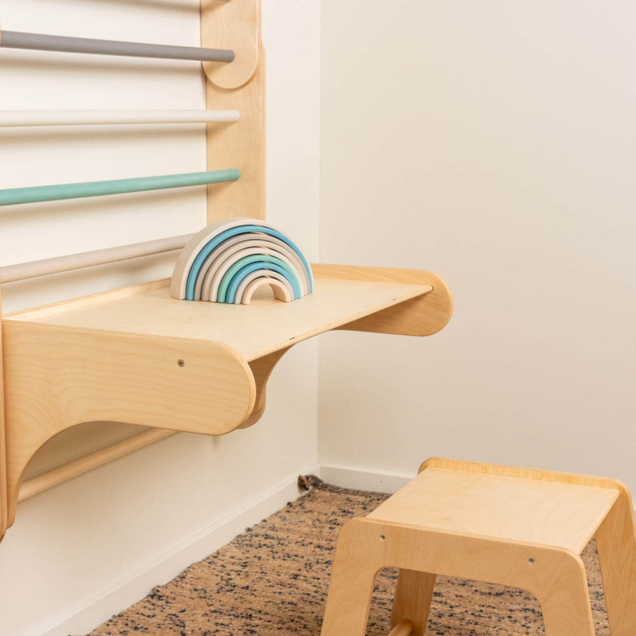 Leg&go table and chair add on made from wood attached to pastel color Swedish ladder set.