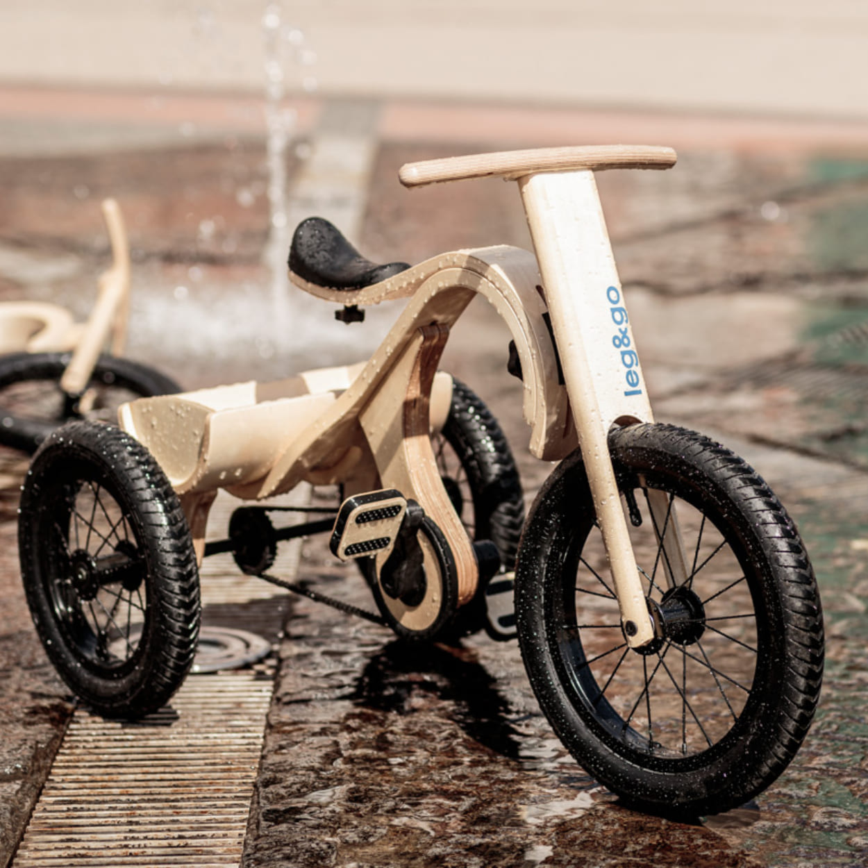 Leg&go wooden bike with tricycle add on in spotlight