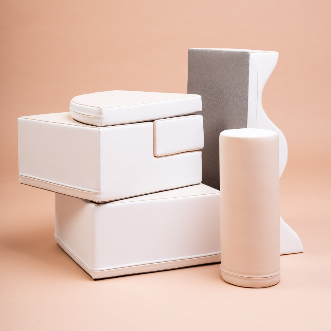 Vertical stacking of beige Explorer blocks showing varied shapes and heights