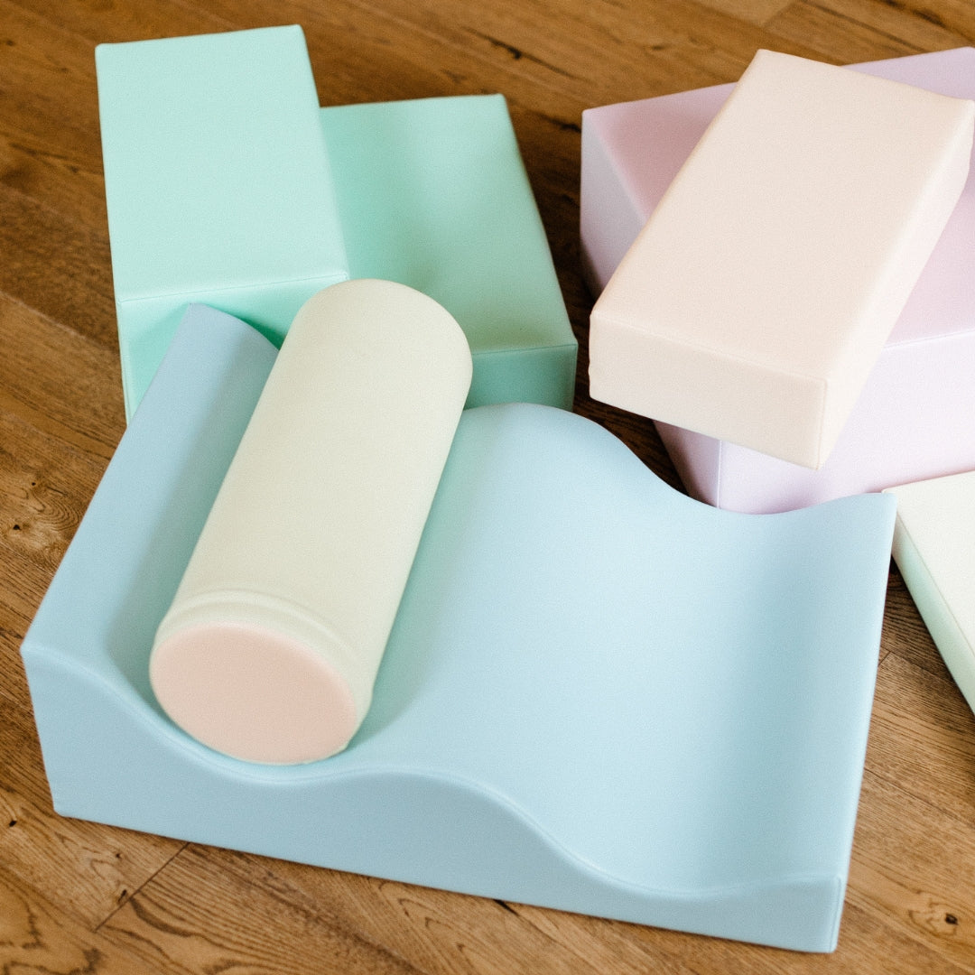 Light pastel Explorer soft play blocks set arranged flat on floor