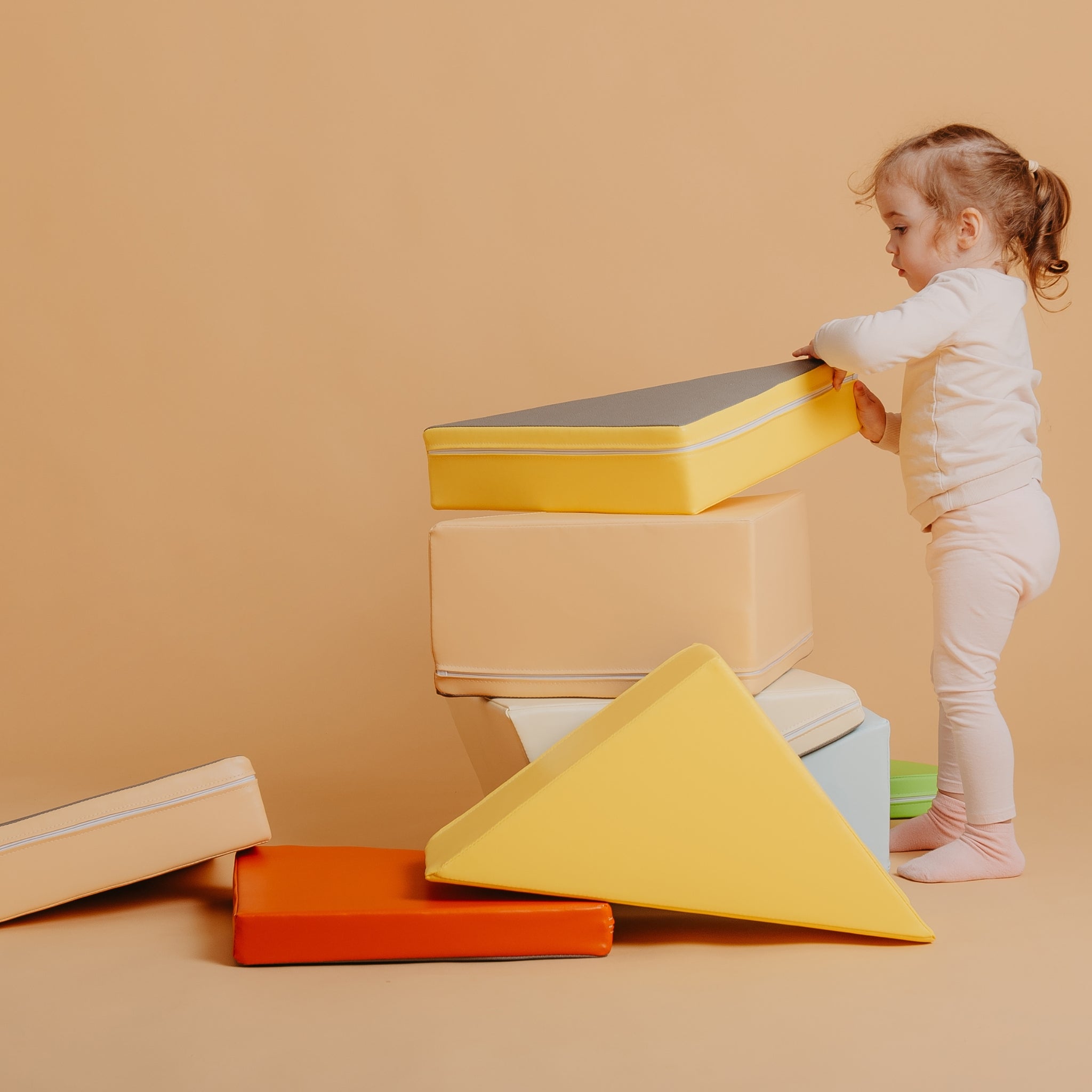 Kubo Blocks Lumo foam building blocks encouraging imaginative play, stacking and motor skill development