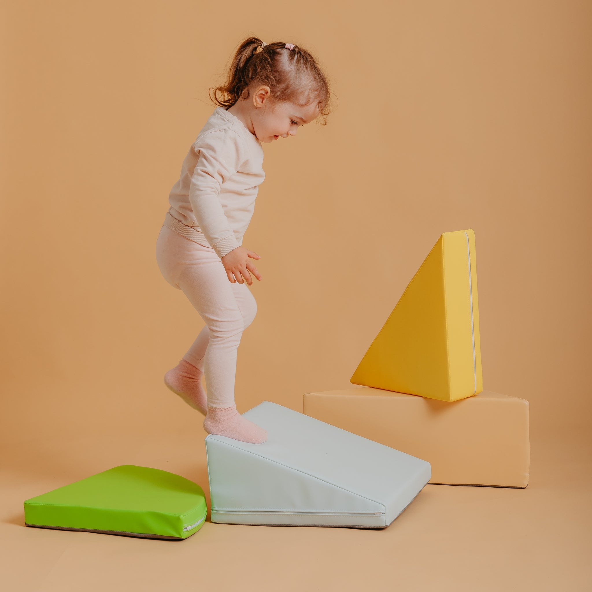 Kubo Blocks Lumo soft play set helping toddlers develop motor skills, balance and creativity through active play