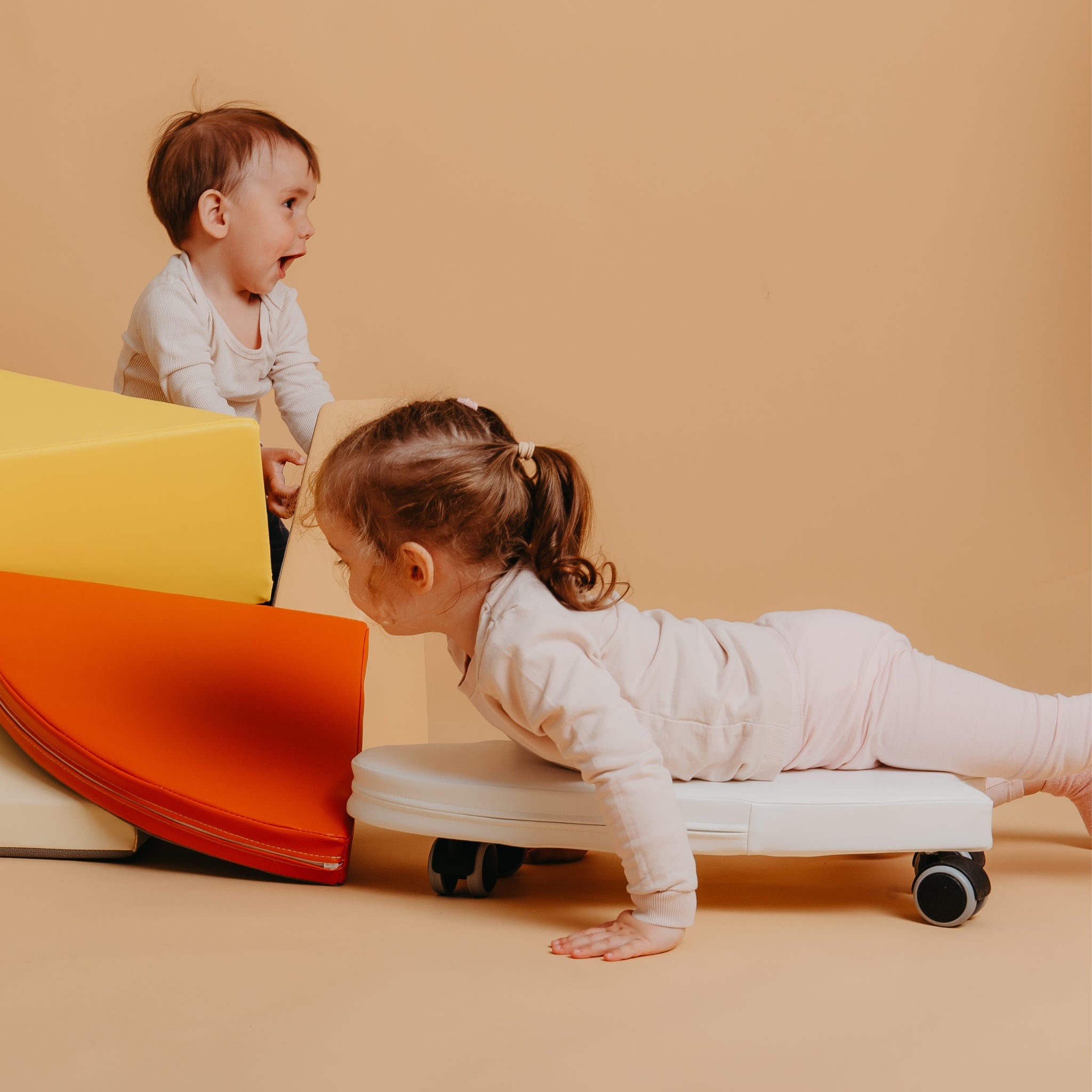 Kubo Blocks Lumo soft play set combined with Surf Soft Ride-On Toy for active indoor play, balance and imaginative adventures