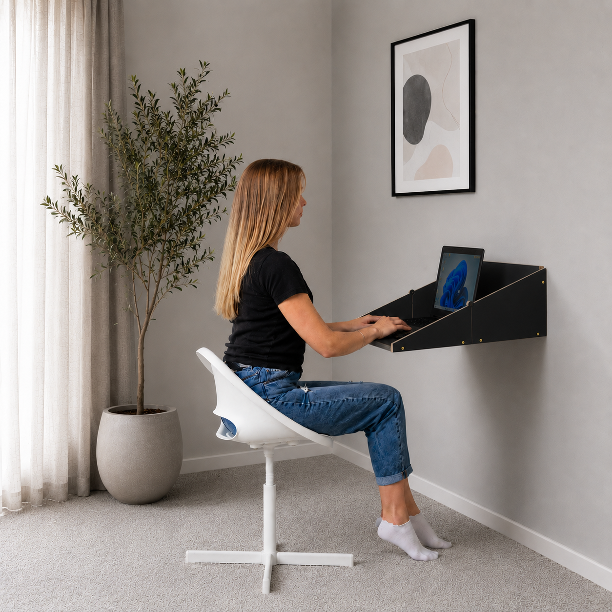 Floating wall mounted desk in black with modern Scandinavian design
