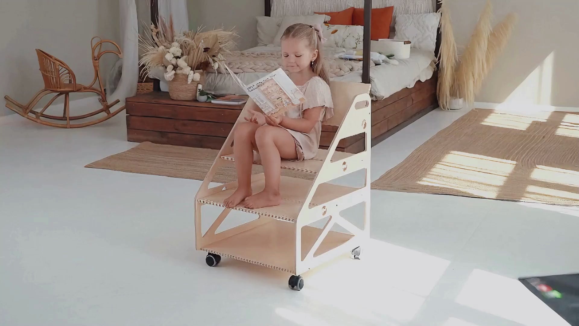 3-in-1 Montessori bookshelf on wheels used as a bookcase, toy shelf and reading chair
