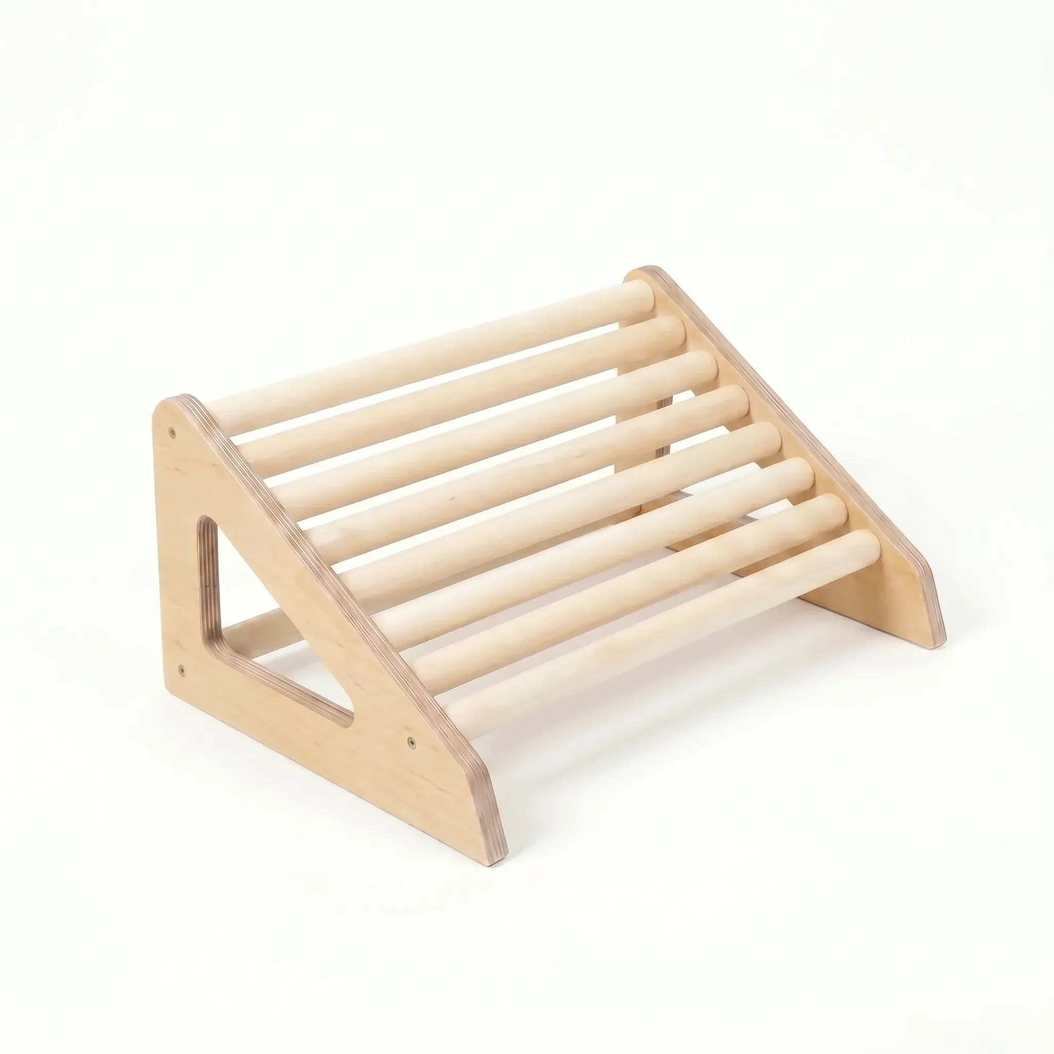 Natural birch wooden footrest roller isolated on white background